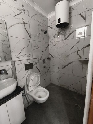 Bathroom in 1 BHK Builder Floor at Aura Homes, Patiala Road – for Sale