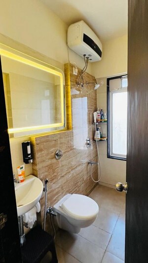 Bathroom in 2 BHK Apartment at Kiran Towers, Malad West – for Rent