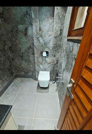 Bathroom in 3 BHK Apartment at Sector 19b Dwarka – for Rent