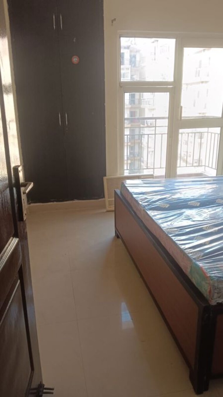 Bedroom, aims-golf-city 2 Bedroom 950 Sq.Ft. Apartment In Sector 75 Noida 10175394