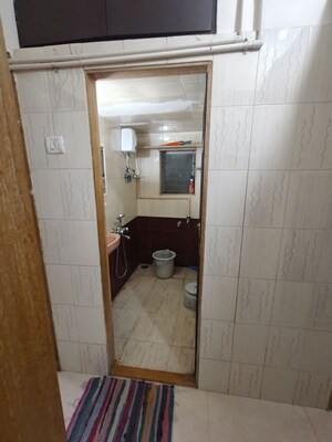 Bathroom in 1 BHK Apartment at Akal CHS, Andheri East – for Rent