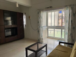 Living Room in 1 BHK Apartment at Manohar Mahal CHS, Mahim – for Rent
