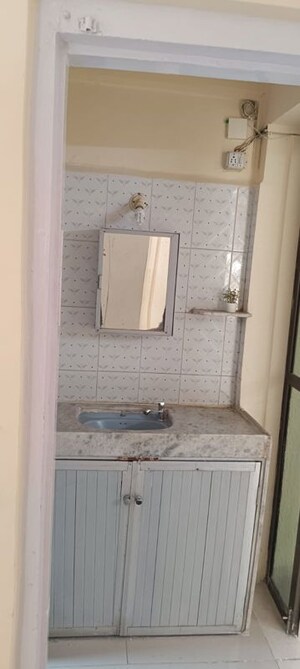 Bathroom in 1 BHK Apartment at Garden View Society, Sion East – for Rent