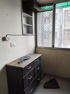 Kitchen in 1 BHK Apartment at RWA Apartments Sector 122, Sector 122 – for Rent