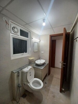 Bathroom in 3 BHK Apartment at Bhartiya Nikoo Homes, Thanisandra Main Road – for Rent