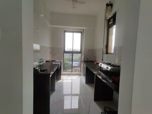 Kitchen in 2 BHK Apartment at Raymond Ten X Habitat, Pokhran Road No Two – for Rent