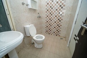 Bathroom in 2 BHK Apartment at Uninav Heights Phase I, Raj Nagar Extension – for Sale