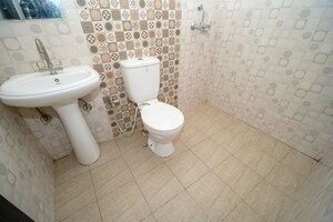 Bathroom in 2 BHK Apartment at Uninav Heights Phase I, Raj Nagar Extension – for Sale