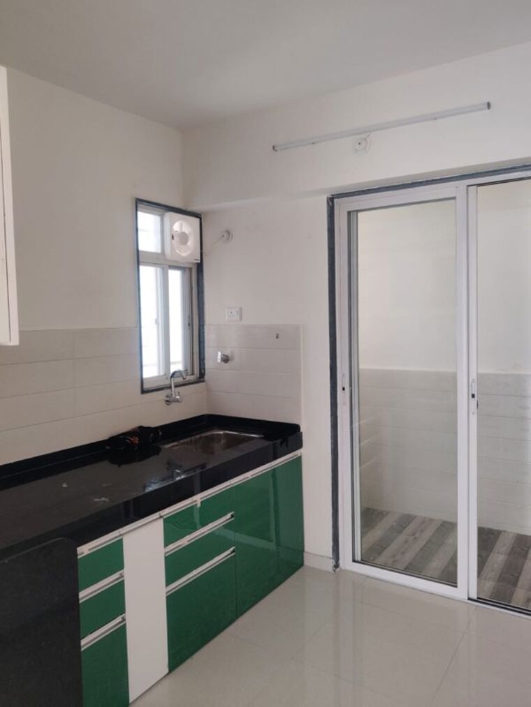 Kitchen, saheel-itrend-life-3 2 Bedroom 628 Sq.Ft. Apartment In Wakad Pune 10175483