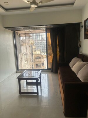 Living Room in 2 BHK Apartment at Gurukrupa Marina Enclave, Malad West – for Rent