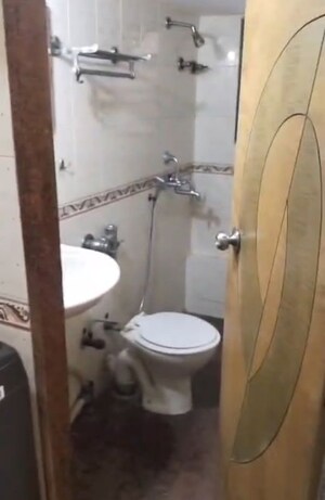 Bathroom in 2 BHK Apartment at Golden Heights Andheri West, Andheri West – for Rent