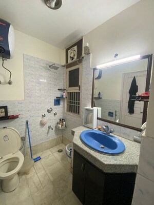 Bathroom in 3 BHK Apartment at Malibu Shopping Arcade, Sector 47 – for Rent