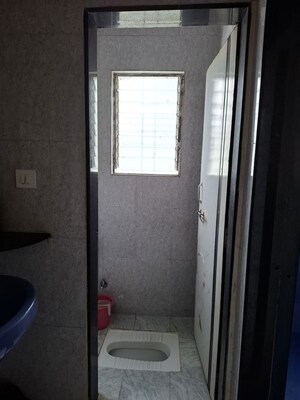 Bathroom in 3 BHK Apartment at Pranayraj Plaza, Dhanori – for Rent