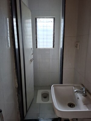 Bathroom in 3 BHK Apartment at Pranayraj Plaza, Dhanori – for Rent