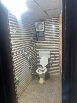 Bathroom in 2 BHK Apartment at Nitishree Aura Chimera, Raj Nagar Extension – for Rent