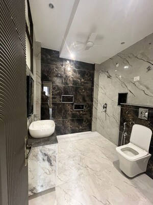 Bathroom in 4 BHK Builder Floor at Green Fields Colony – for Rent