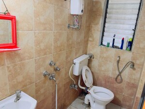 Bathroom in 3 BHK Apartment at Oberoi Realty Splendor, Andheri East – for Sale