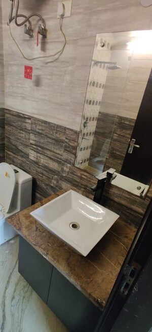 Bathroom in 3 BHK Builder Floor at Palam Vihar Residents Association, Palam Vihar – for Rent