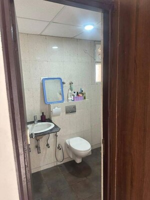 Bathroom in 2 BHK Apartment at Supertech The Romano, Sector 118 – for Rent