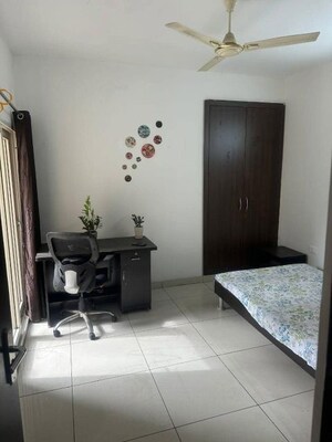 Living Room in 2 BHK Apartment at Supertech The Romano, Sector 118 – for Rent