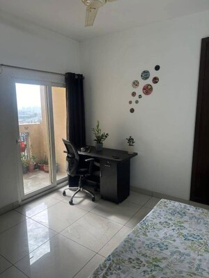Living Room in 2 BHK Apartment at Supertech The Romano, Sector 118 – for Rent