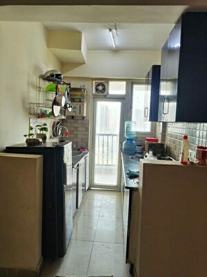 Kitchen in 2 BHK Apartment at La Residentia, Tech Zone 4 Greater Noida – for Rent