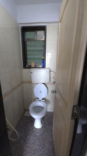 Bathroom in 1 BHK Apartment at Onkar CHS, Goregaon East – for Rent