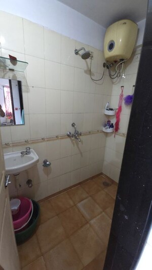 Bathroom in 1 BHK Apartment at Onkar CHS, Goregaon East – for Rent