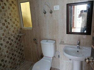 Bathroom in 3 BHK Apartment at Mahagun Mantra I, Sector 10 Greater Noida – for Rent