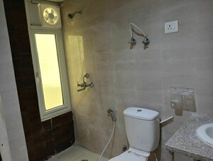 Bathroom in 3 BHK Apartment at Mahagun Mantra I, Sector 10 Greater Noida – for Rent