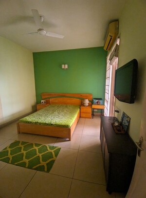 Bedroom in 3 BHK Apartment at Eros Woodbury Tower, Charmwood Village – for Sale