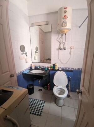 Master Bedroom in 3 BHK Apartment at Eros Woodbury Tower, Charmwood Village – for Sale