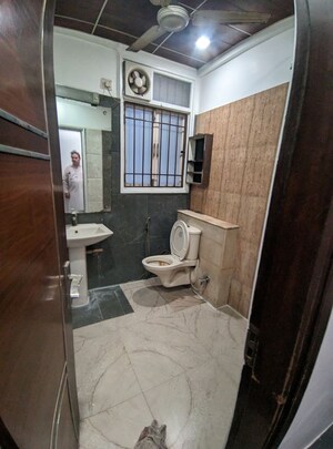 Bathroom in 2 BHK Apartment at Eros Southend Apartments, Charmwood Village – for Rent