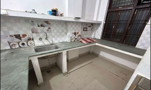 Kitchen in 2 BHK Apartment at Husainganj – for Rent