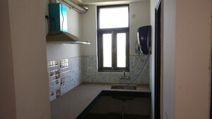 Kitchen in 1 BHK Apartment at Techman Moti Residency, Raj Nagar Extension – for Sale
