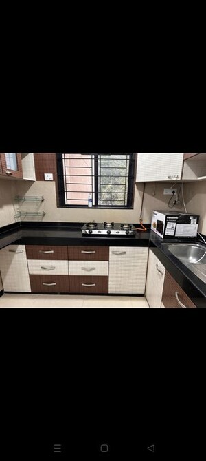 Kitchen in 2 BHK Apartment at Hiranandani Estate Queens, Ghodbunder Road – for Rent