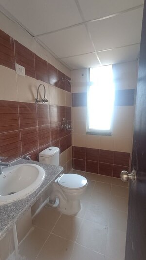 Bathroom in 2 BHK Apartment at Mahagun My Woods, Sector 16c Greater Noida – for Rent