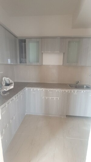 Kitchen in 2 BHK Apartment at Mahagun My Woods, Sector 16c Greater Noida – for Rent