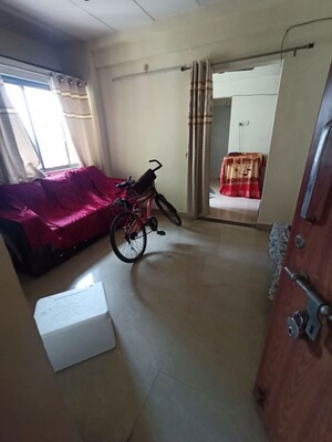 Living Room in 1 BHK Apartment at Swapnapurti CHS Kharghar, Kharghar – for Rent