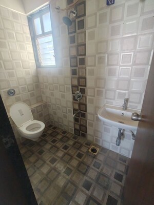 Bathroom in 1 BHK Apartment at Kanchan Onyx, Pisoli – for Rent