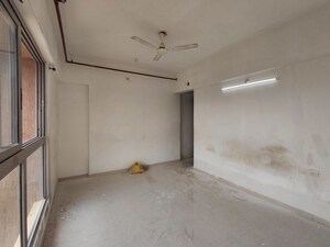 Room in 2.5 BHK Apartment at The Wadhwa Anmol Fortune, Goregaon West – for Sale