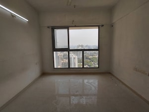 Room in 2.5 BHK Apartment at The Wadhwa Anmol Fortune, Goregaon West – for Sale
