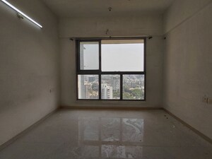 Room in 2.5 BHK Apartment at The Wadhwa Anmol Fortune, Goregaon West – for Sale