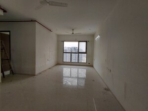 Room in 2.5 BHK Apartment at The Wadhwa Anmol Fortune, Goregaon West – for Sale