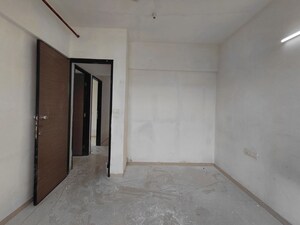 Room in 2.5 BHK Apartment at The Wadhwa Anmol Fortune, Goregaon West – for Sale