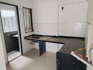 Kitchen in 2 BHK Apartment at Basil Mondale, Mundhwa – for Rent