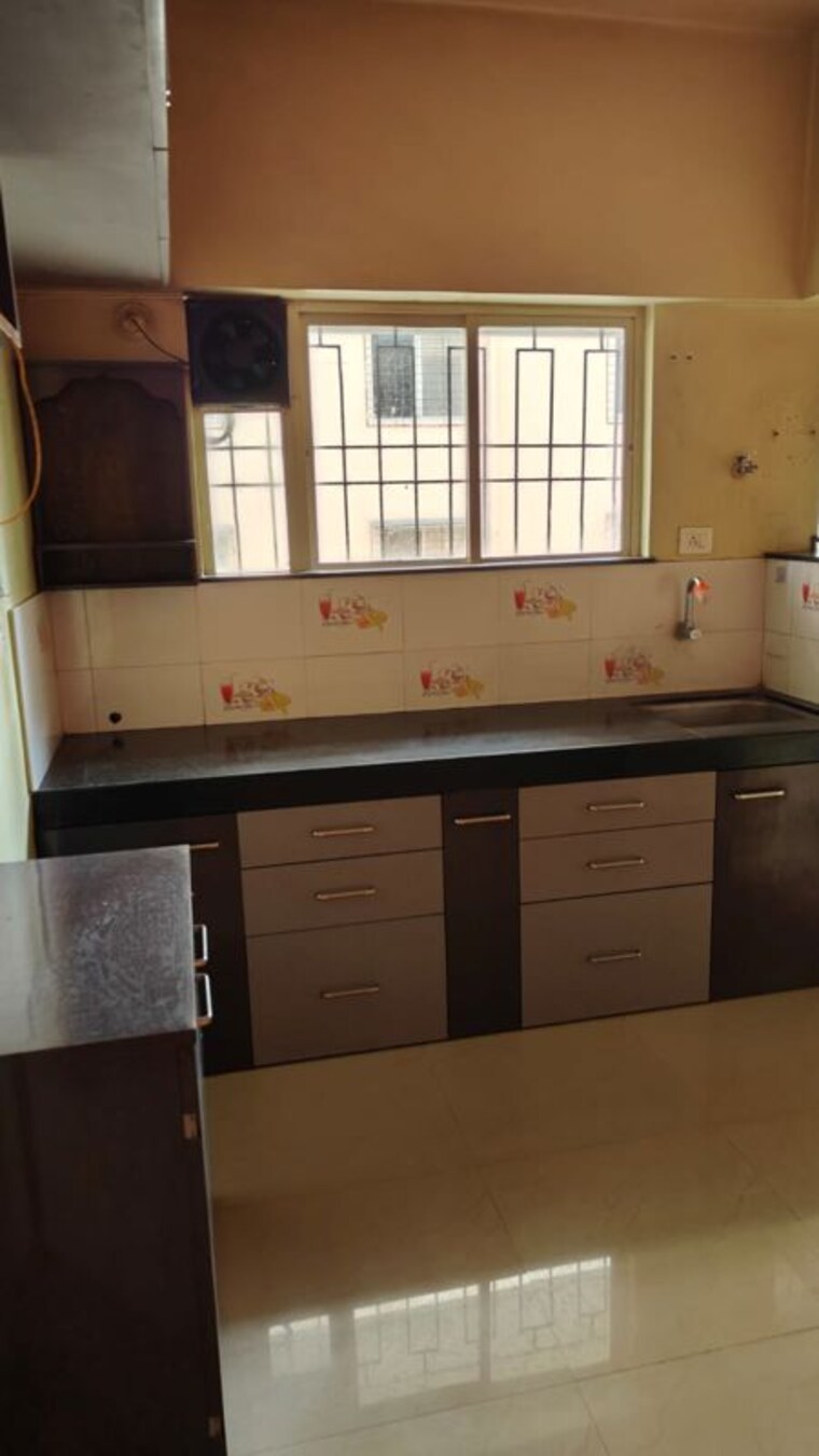 Kitchen, sus 2 Bedroom 1000 Sq.Ft. Apartment In Sus Pune 10176941