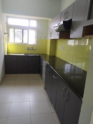 Kitchen in 2 BHK Apartment at Brigade Buena Vista, Budigere – for Rent
