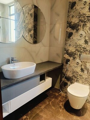 Bathroom in 4 BHK Apartment at ABA Cleo County, Sector 121 – for Rent