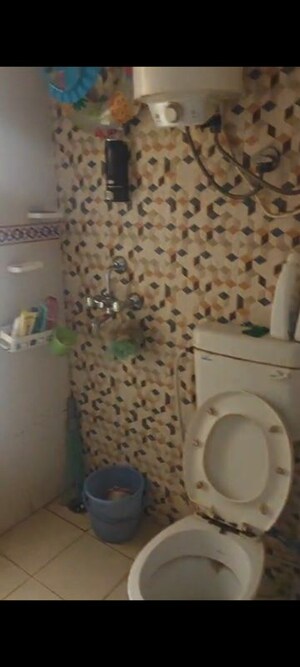 Bathroom in 1 BHK Apartment at Nilaya Greens, Raj Nagar Extension – for Sale